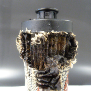 Burnt filter element caused by electrostatic discharge in systems