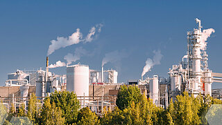 Paper industry plant in the countryside with graphic honeycomb pattern